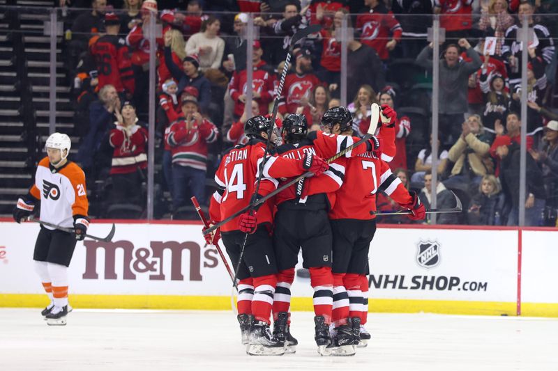 Jan 18, 2025; Newark, New Jersey, USA; New Jersey Devils defenseman Dougie Hamilton (7) celebrates his goal against the Philadelphia Flyers during the first period at Prudential Center. Mandatory Credit: Ed Mulholland-Imagn Images