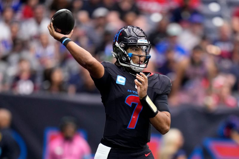 Houston Texans quarterback C.J. Stroud throws a pass during the first half of an NFL football game against the Buffalo Bills, Sunday, Oct. 6, 2024, in Houston. (AP Photo/Eric Christian Smith)