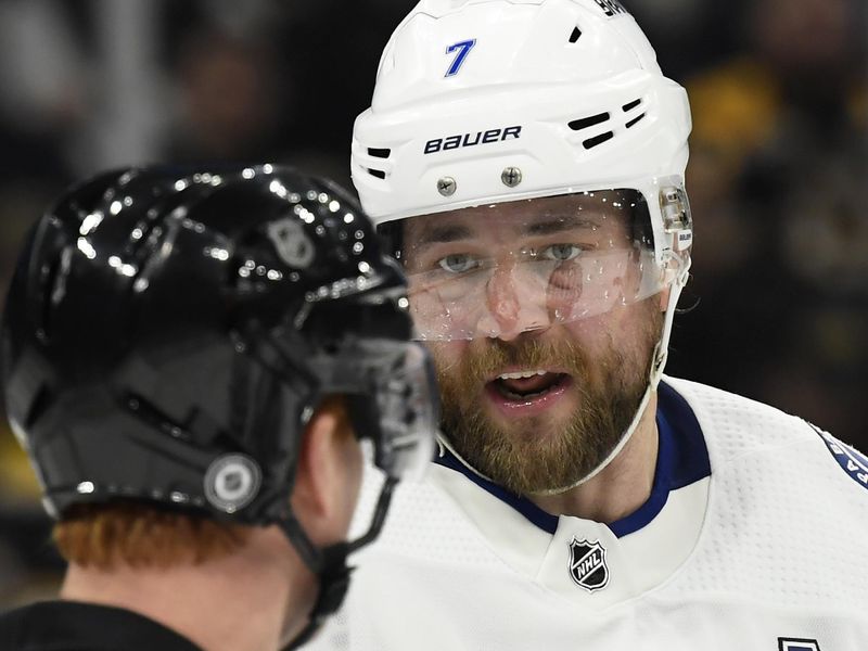 Feb 13, 2024; Boston, Massachusetts, USA;  Tampa Bay Lightning goaltender Andrei Vasilevskiy (88) has words with referee Tom Chmielewski during the third period against the Boston Bruins at TD Garden. Mandatory Credit: Bob DeChiara-USA TODAY Sports