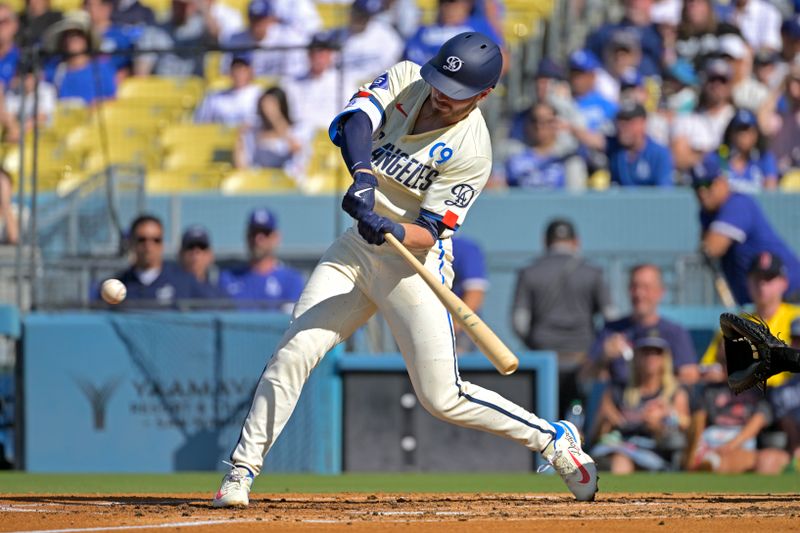 Jul 20, 2024; Los Angeles, California, USA;  Los Angeles Dodgers second baseman Gavin Lux (9) hits a solo home run in the second inning against the Boston Red Sox at Dodger Stadium. Mandatory Credit: Jayne Kamin-Oncea-USA TODAY Sports