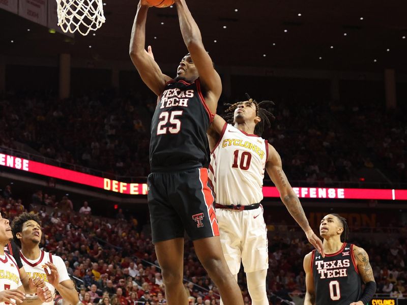 Feb 17, 2024; Ames, Iowa, USA; Texas Tech Red Raiders forward Robert Jennings (25) drives to the basket in front of Iowa State Cyclones guard Keshon Gilbert (10) during the second half at James H. Hilton Coliseum. Mandatory Credit: Reese Strickland-USA TODAY Sports