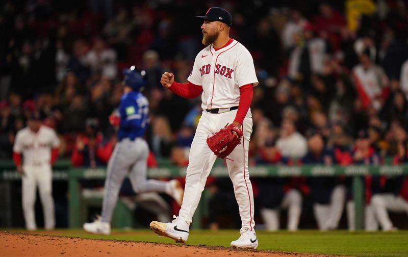Apr 9, 2025; Boston, Massachusetts, USA; Boston Red Sox pitcher Greg Weissert (57) reacts after a pop fly to end the side against the Toronto Blue Jays in the tenth inning at Fenway Park. Mandatory Credit: David Butler II-Imagn Images