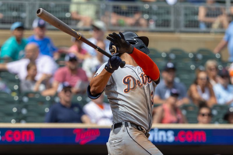 Aug 16, 2023; Minneapolis, Minnesota, USA; Detroit Tigers center fielder Riley Greene (31) hits a RBI sacrifice fly against the Minnesota Twins in the ninth inning at Target Field. Mandatory Credit: Jesse Johnson-USA TODAY Sports