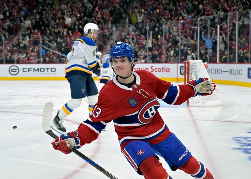 Oct 26, 2024; Montreal, Quebec, CAN; Montreal Canadiens forward Cole Caufield (13) celebrates after scoring a goal against the St.Louis Blues during the third period at the Bell Centre. Mandatory Credit: Eric Bolte-Imagn Images