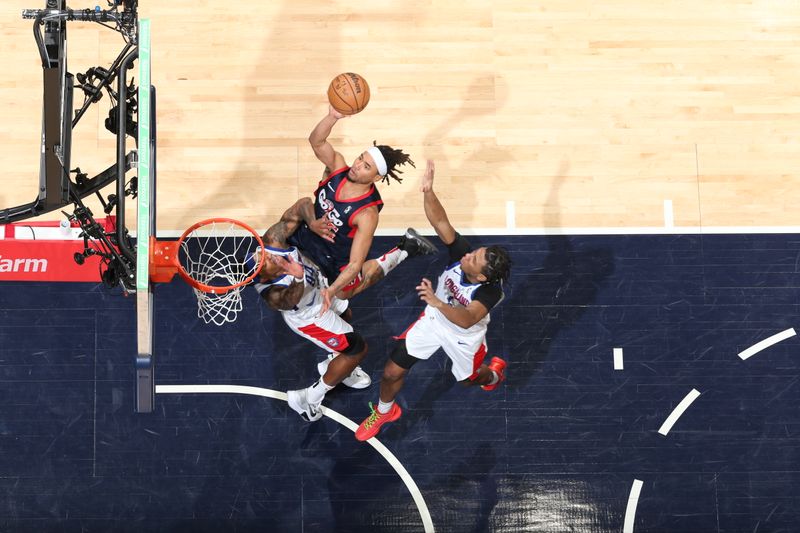 WASHINGTON, DC -? MARCH 8:  Devon Dotson #15 of the Capital City Go-Go goes to the basket during the game against the Long Island Nets on March 8, 2024 at Capital One Arena in Washington, DC. NOTE TO USER: User expressly acknowledges and agrees that, by downloading and or using this Photograph, user is consenting to the terms and conditions of the Getty Images License Agreement. Mandatory Copyright Notice: Copyright 2024 NBAE (Photo by Stephen Gosling/NBAE via Getty Images)