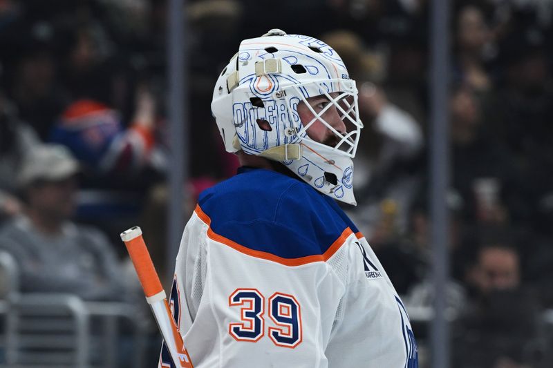 Feb 26, 2026; Los Angeles, California, USA; Edmonton Oilers goaltender Connor Ingram (39) looks down ice during the second period against the Los Angeles Kings at Crypto.com Arena. Mandatory Credit: Griffin Hooper-Imagn Images  
