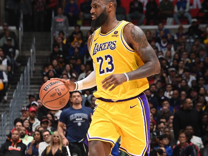 LOS ANGELES, CA - FEBRUARY 28: LeBron James #23 of the Los Angeles Lakers dribbles the ball during the game against the LA Clippers on February 28, 2024 at Crypto.Com Arena in Los Angeles, California. NOTE TO USER: User expressly acknowledges and agrees that, by downloading and/or using this Photograph, user is consenting to the terms and conditions of the Getty Images License Agreement. Mandatory Copyright Notice: Copyright 2024 NBAE (Photo by Andrew D. Bernstein/NBAE via Getty Images)