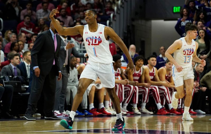 Feb 15, 2023; Evanston, Illinois, USA; Northwestern Wildcats guard Chase Audige (1) gestures after making a three point basket against the Indiana Hoosiers during the first half at Welsh-Ryan Arena. Mandatory Credit: David Banks-USA TODAY Sports