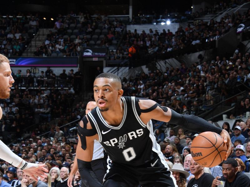 SAN ANTONIO, TX - NOVEMBER 2: Keldon Johnson #0 of the San Antonio Spurs drives to the basket during the game against the Minnesota Timberwolves on November 2, 2024 at the Frost Bank Center in San Antonio, Texas. NOTE TO USER: User expressly acknowledges and agrees that, by downloading and or using this photograph, user is consenting to the terms and conditions of the Getty Images License Agreement. Mandatory Copyright Notice: Copyright 2024 NBAE (Photos by Michael Gonzales/NBAE via Getty Images)