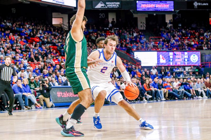 Jan 9, 2024; Boise, Idaho, USA; Boise State Broncos forward Tyson Degenhart (2) drives the ball during the second half against the Colorado State Rams at ExtraMile Arena. Mandatory Credit: Brian Losness-USA TODAY Sports