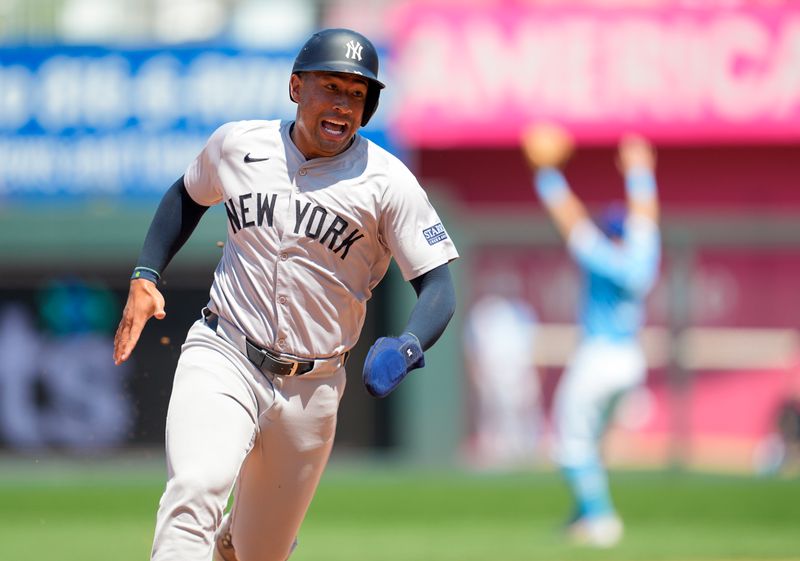 Jun 13, 2024; Kansas City, Missouri, USA; New York Yankees right fielder Jahmai Jones (14) runs to third base during the eighth inning against the Kansas City Royals at Kauffman Stadium. Mandatory Credit: Jay Biggerstaff-USA TODAY Sports