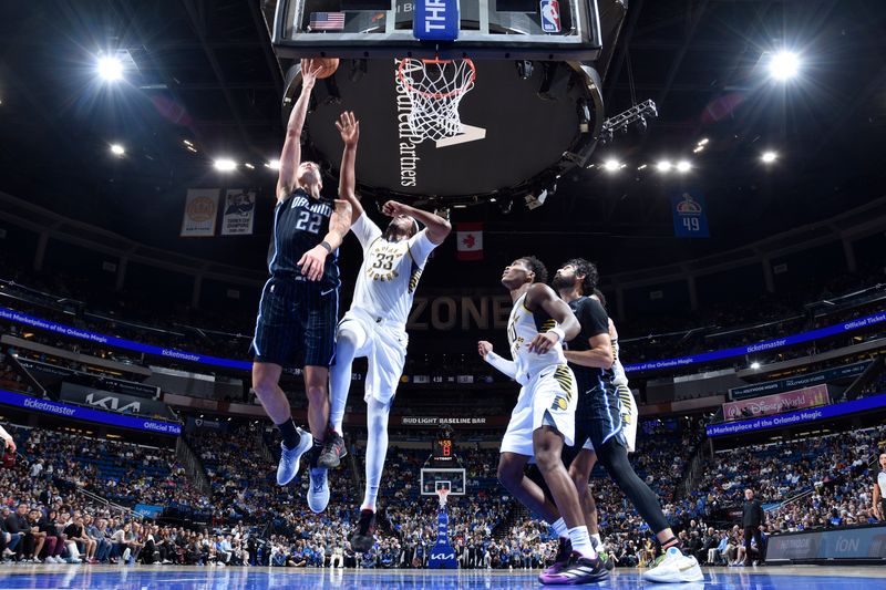 ORLANDO, FL - NOVEMBER 13: Franz Wagner #22 of the Orlando Magic drives to the basket during the game against the Indiana Pacers on November 13, 2024 at Kia Center in Orlando, Florida. NOTE TO USER: User expressly acknowledges and agrees that, by downloading and or using this photograph, User is consenting to the terms and conditions of the Getty Images License Agreement. Mandatory Copyright Notice: Copyright 2024 NBAE (Photo by Fernando Medina/NBAE via Getty Images)