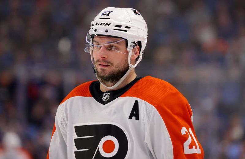 Apr 5, 2024; Buffalo, New York, USA;  Philadelphia Flyers center Scott Laughton (21) during a stoppage in play against the Buffalo Sabres during the third period at KeyBank Center. Mandatory Credit: Timothy T. Ludwig-USA TODAY Sports