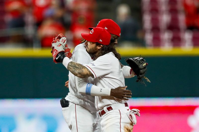 Sep 18, 2023; Cincinnati, Ohio, USA; Cincinnati Reds shortstop Elly De La Cruz (44) hugs second baseman Jonathan India (6) after the victory over the Minnesota Twins at Great American Ball Park. Mandatory Credit: Katie Stratman-USA TODAY Sports