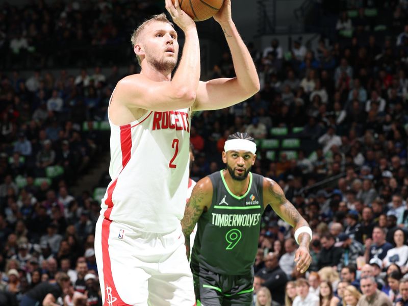 MINNEAPOLIS, MN -  NOVEMBER 26: Jock Landale #2 of the Houston Rockets shoots a free throw during the game against the Minnesota Timberwolves during the Emirates NBA Cup game on November 26, 2024 at Target Center in Minneapolis, Minnesota. NOTE TO USER: User expressly acknowledges and agrees that, by downloading and or using this Photograph, user is consenting to the terms and conditions of the Getty Images License Agreement. Mandatory Copyright Notice: Copyright 2024 NBAE (Photo by David Sherman/NBAE via Getty Images)