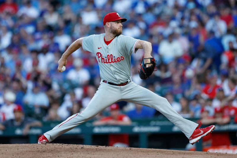 Jul 3, 2024; Chicago, Illinois, USA; Philadelphia Phillies starting pitcher Zack Wheeler (45) delivers a pitch against the Chicago Cubs during the second inning at Wrigley Field. Mandatory Credit: Kamil Krzaczynski-USA TODAY Sports