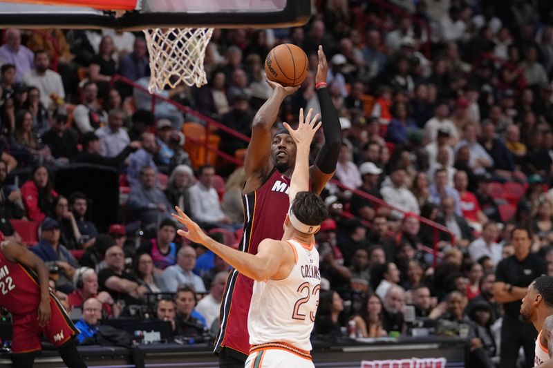 MIAMI, FL - FEBRUARY 7: Bam Adebayo #13 of the Miami Heat shoots the ball during the game against the San Antonio Spurs on February 7, 2024 at Kaseya Center in Miami, Florida. NOTE TO USER: User expressly acknowledges and agrees that, by downloading and or using this Photograph, user is consenting to the terms and conditions of the Getty Images License Agreement. Mandatory Copyright Notice: Copyright 2024 NBAE (Photo by Eric Espada/NBAE via Getty Images)