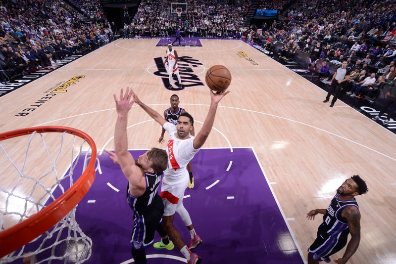 SACRAMENTO, CA - JANUARY 5: Jontay Porter #11 of the Toronto Raptors shoots the ball during the game against the Sacramento Kings on January 5, 2024 at Golden 1 Center in Sacramento, California. NOTE TO USER: User expressly acknowledges and agrees that, by downloading and or using this Photograph, user is consenting to the terms and conditions of the Getty Images License Agreement. Mandatory Copyright Notice: Copyright 2024 NBAE (Photo by Rocky Widner/NBAE via Getty Images)