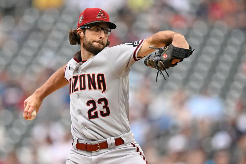 Aug 6, 2023; Minneapolis, Minnesota, USA; Arizona Diamondbacks pitcher Zac Gallen (23) delivers a pitch against the Minnesota Twins during the second inning at Target Field. Mandatory Credit: Nick Wosika-USA TODAY Sports