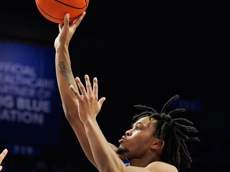 Nov 10, 2023; Lexington, Kentucky, USA; Kentucky Wildcats guard D.J. Wagner (21) shoots the ball during the second half against the Texas A&M Commerce Lions at Rupp Arena at Central Bank Center. Mandatory Credit: Jordan Prather-USA TODAY Sports