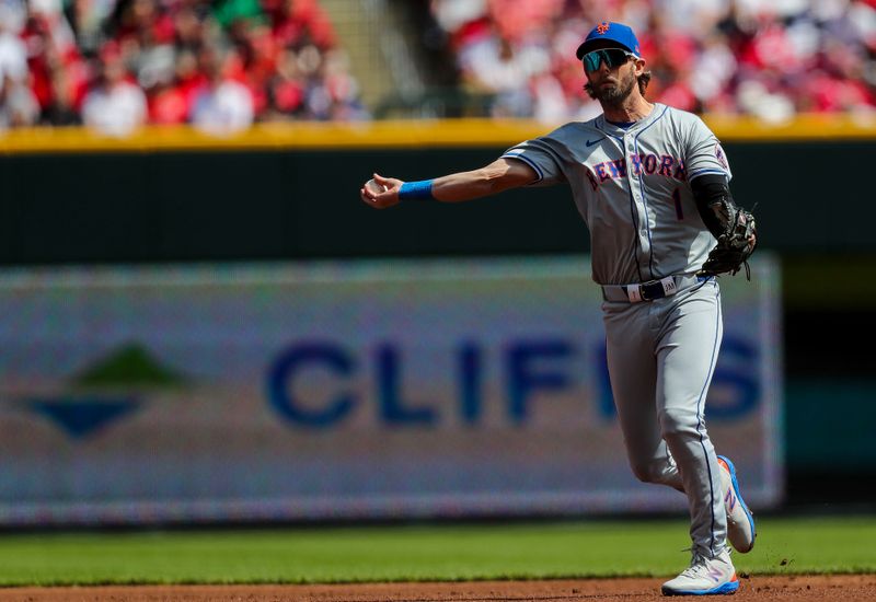 Apr 7, 2024; Cincinnati, Ohio, USA; New York Mets second baseman Jeff McNeil (1) throws to first to get Cincinnati Reds designated hitter Jonathan India (not pictured) out in the first inning at Great American Ball Park. Mandatory Credit: Katie Stratman-USA TODAY Sports