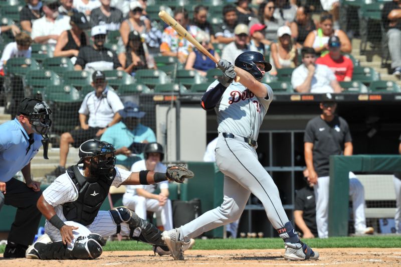 Aug 25, 2024; Chicago, Illinois, USA; Detroit Tigers second base Colt Keith (33) hits an RBI single during the third inning against the Chicago White Sox at Guaranteed Rate Field. Mandatory Credit: Patrick Gorski-USA TODAY Sports