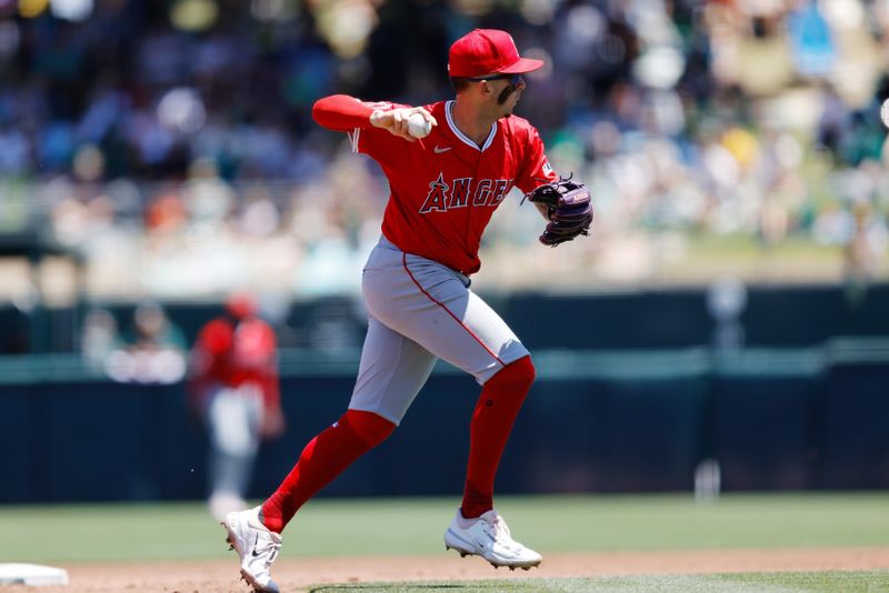 May 22, 2025; West Sacramento, California, USA; Los Angeles Angels shortstop Zach Neto (9) throws to first base for an out against the Athletics during the third inning at Sutter Health Park. Mandatory Credit: Sergio Estrada-Imagn Images