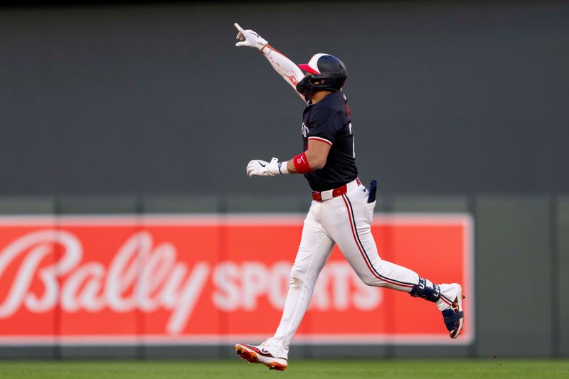 Jun 10, 2024; Minneapolis, Minnesota, USA; Minnesota Twins third baseman Royce Lewis (23) celebrates hitting a two-run home against the Colorado Rockies in the eighth inning at Target Field. Mandatory Credit: Jesse Johnson-USA TODAY Sports