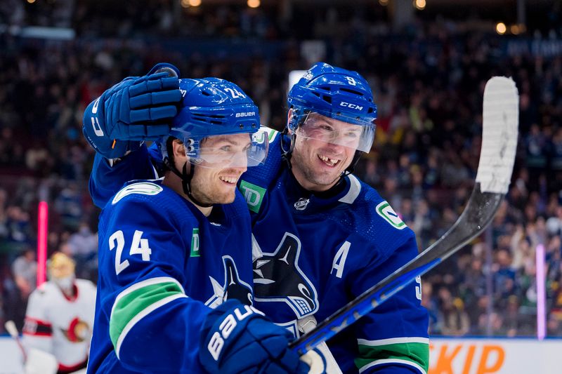 Jan 2, 2024; Vancouver, British Columbia, CAN; Vancouver Canucks forward Pius Suter (24) and forward J.T. Miller (9) celebrate Suter   s second goal of the game against the Ottawa Senators in the third period at Rogers Arena. Mandatory Credit: Bob Frid-USA TODAY Sports