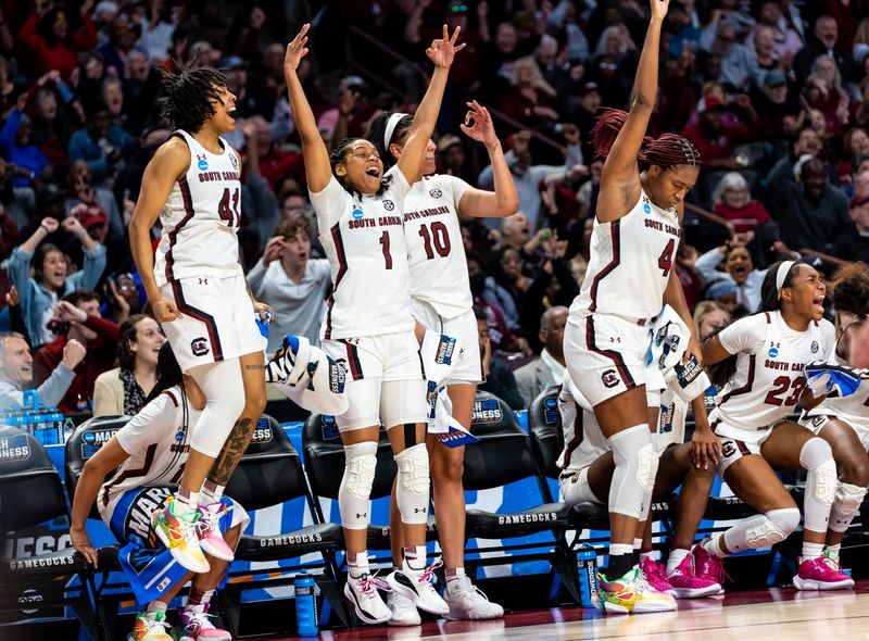 Mar 19, 2023; Columbia, SC, USA; South Carolina Gamecocks guard Zia Cooke (1), guard Kierra Fletcher (41), center Kamilla Cardoso (10) and forward Aliyah Boston (4) celebrate a play against the South Florida Bulls in the second half of South Carolina Gamecocks 76-45 victory at Colonial Life Arena, advancing them to the Sweet 16. Mandatory Credit: Jeff Blake-USA TODAY Sports