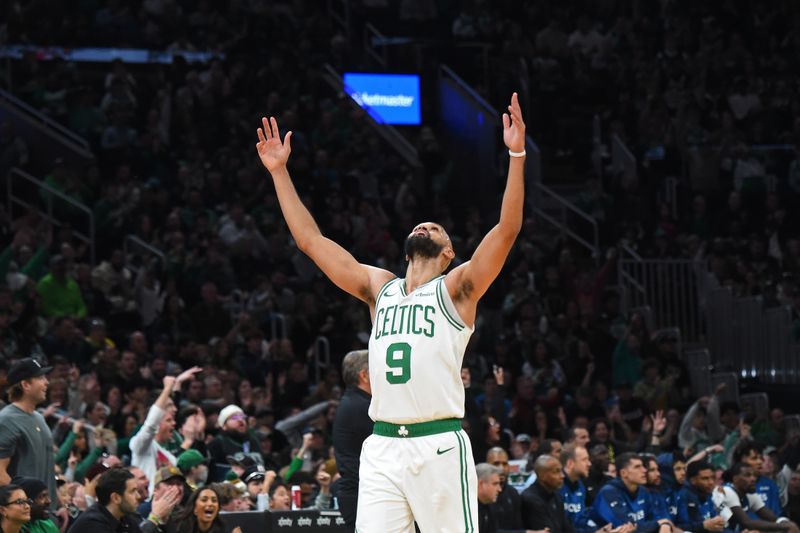 BOSTON, MA - NOVEMBER 24: Derrick White #9 of the Boston Celtics celebrates during the game against the Minnesota Timberwolves on November 24, 2024 at the TD Garden in Boston, Massachusetts. NOTE TO USER: User expressly acknowledges and agrees that, by downloading and or using this photograph, User is consenting to the terms and conditions of the Getty Images License Agreement. Mandatory Copyright Notice: Copyright 2024 NBAE(Photo by Brian Babineau/NBAE via Getty Images)