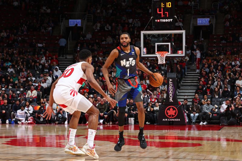 TORONTO, CANADA - MARCH 25: Mikal Bridges #1 of the Brooklyn Nets looks on during the game against the Toronto Raptors on March 25, 2024 at the Scotiabank Arena in Toronto, Ontario, Canada.  NOTE TO USER: User expressly acknowledges and agrees that, by downloading and or using this Photograph, user is consenting to the terms and conditions of the Getty Images License Agreement.  Mandatory Copyright Notice: Copyright 2024 NBAE (Photo by Vaughn Ridley/NBAE via Getty Images)