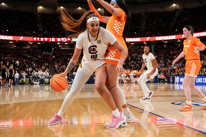 Mar 9, 2024; Greensville, SC, USA; South Carolina Gamecocks center Kamilla Cardoso (10) tries to get past Tennessee Lady Vols center Tamari Key (20) during the second half at Bon Secours Wellness Arena. Mandatory Credit: Jim Dedmon-USA TODAY Sports