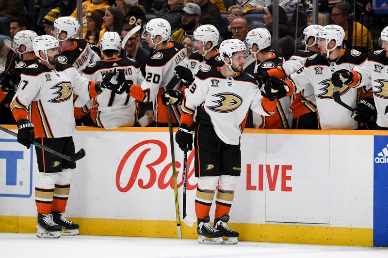 Jan 9, 2024; Nashville, Tennessee, USA; Anaheim Ducks center Mason McTavish (23) celebrates after scoring inner at Bridgestone Arena. Mandatory Credit: Christopher Hanewinckel-USA TODAY Sports