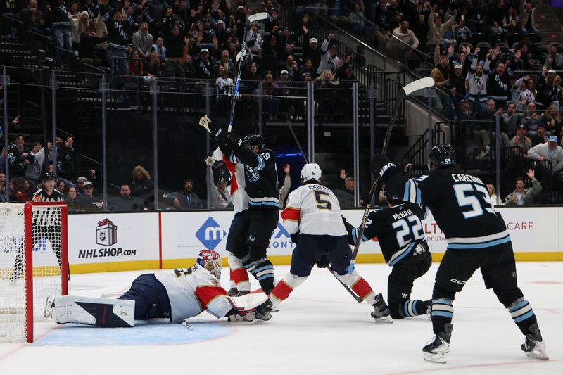 Dec 10, 2025; Salt Lake City, Utah, USA; The Utah Mammoth celebrate a goal by center Jack McBain (22) during the second period at Delta Center. Mandatory Credit: Rob Gray-Imagn Images
