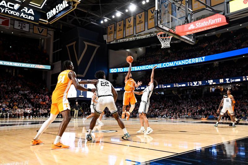 Jan 18, 2025; Nashville, Tennessee, USA;  Tennessee Volunteers guard Zakai Zeigler (5) shoots the ball against the Tennessee Volunteers during the second half at Memorial Gymnasium. Mandatory Credit: Steve Roberts-Imagn Images