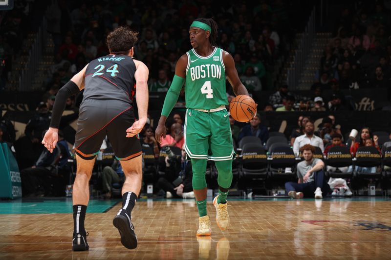 WASHINGTON, DC -? MARCH 17: Jrue Holiday #4 of the Boston Celtics dribbles the ball during the game against the Washington Wizards on March 17, 2024 at Capital One Arena in Washington, DC. NOTE TO USER: User expressly acknowledges and agrees that, by downloading and or using this Photograph, user is consenting to the terms and conditions of the Getty Images License Agreement. Mandatory Copyright Notice: Copyright 2024 NBAE (Photo by Stephen Gosling/NBAE via Getty Images)