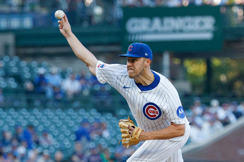 May 14, 2025; Chicago, Illinois, USA; Chicago Cubs starting pitcher Jameson Taillon (50) delivers a pitch against the Miami Marlins during the first inning at Wrigley Field. Mandatory Credit: Kamil Krzaczynski-Imagn Images