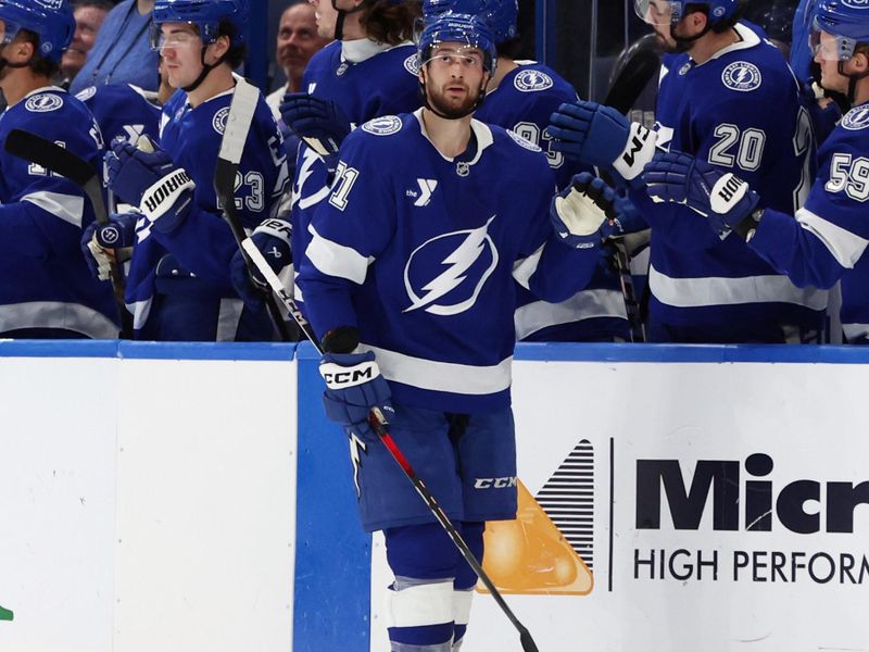 Dec 5, 2024; Tampa, Florida, USA; Tampa Bay Lightning center Anthony Cirelli (71) is congratulated after he scored a goal against the San Jose Sharks during the second period at Amalie Arena. Mandatory Credit: Kim Klement Neitzel-Imagn Images