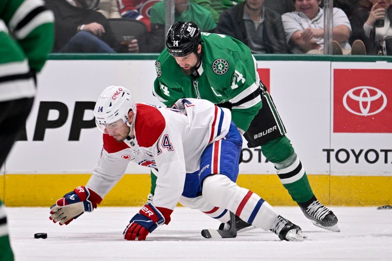 Jan 16, 2025; Dallas, Texas, USA; Montreal Canadiens center Nick Suzuki (14) makes a hand pass in front of Dallas Stars left wing Jamie Benn (14) during the third period at the American Airlines Center. Mandatory Credit: Jerome Miron-Imagn Images