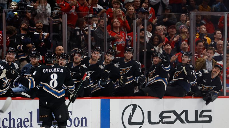 Nov 6, 2024; Washington, District of Columbia, USA; Washington Capitals left wing Alex Ovechkin (8) celebrates with teammates after scoring a goal against the Nashville Predators in the third period at Capital One Arena. Mandatory Credit: Geoff Burke-Imagn Images