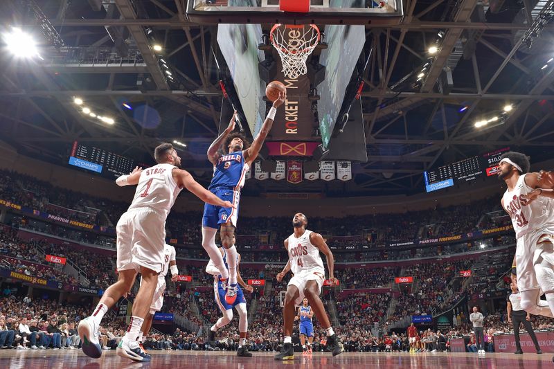 CLEVELAND, OH - MARCH 29: Kelly Oubre Jr. #9 of the Philadelphia 76ers drives to the basket during the game against the Cleveland Cavaliers on March 29, 2024 at Rocket Mortgage FieldHouse in Cleveland, Ohio. NOTE TO USER: User expressly acknowledges and agrees that, by downloading and/or using this Photograph, user is consenting to the terms and conditions of the Getty Images License Agreement. Mandatory Copyright Notice: Copyright 2024 NBAE (Photo by David Liam Kyle/NBAE via Getty Images)