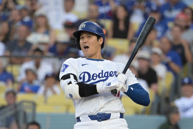 Jul 22, 2024; Los Angeles, California, USA;  Los Angeles Dodgers designated hitter Shohei Ohtani (17) backs off an inside pitch in the first inning against the San Francisco Giants at Dodger Stadium. Mandatory Credit: Jayne Kamin-Oncea-USA TODAY Sports