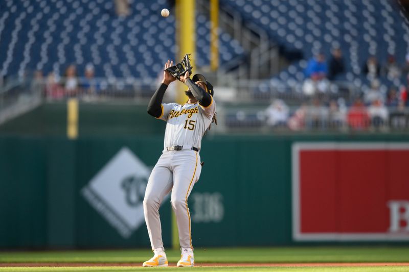 Apr 4, 2024; Washington, District of Columbia, USA; Pittsburgh Pirates shortstop Oneil Cruz (15) catches a fly ball during the second inning against the Washington Nationals at Nationals Park. Mandatory Credit: Reggie Hildred-USA TODAY Sports