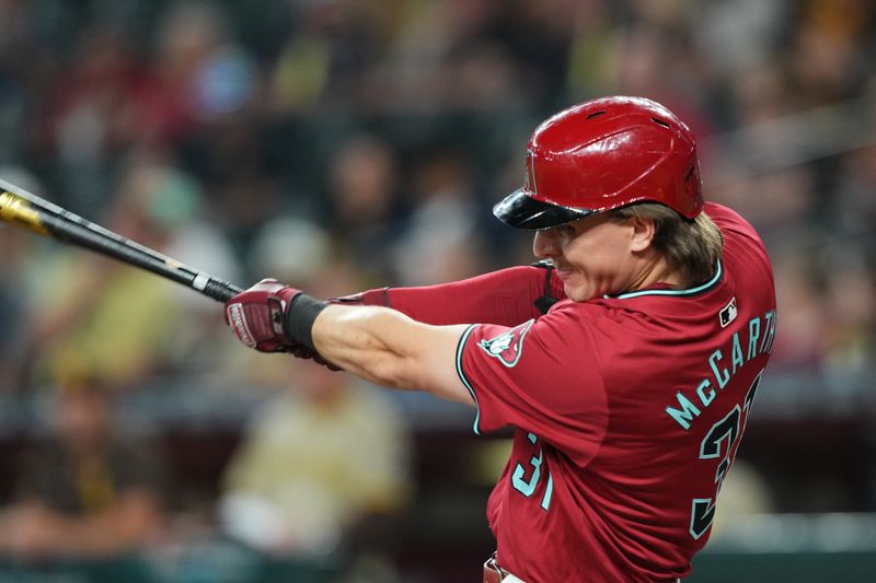 May 5, 2024; Phoenix, Arizona, USA; Arizona Diamondbacks outfielder Jake McCarthy (31) bats against the San Diego Padres during the fourth inning at Chase Field. Mandatory Credit: Joe Camporeale-USA TODAY Sports