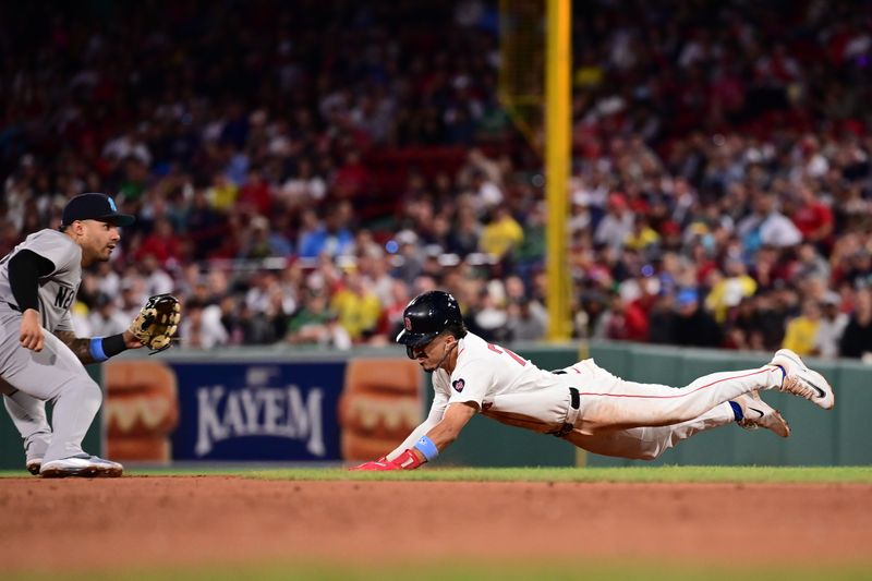 Jun 16, 2024; Boston, Massachusetts, USA; Boston Red Sox shortstop David Hamilton (70)n steals second base  against New York Yankees second baseman Gleyber Torres (25) during the eighth inning at Fenway Park. Mandatory Credit: Eric Canha-USA TODAY Sports