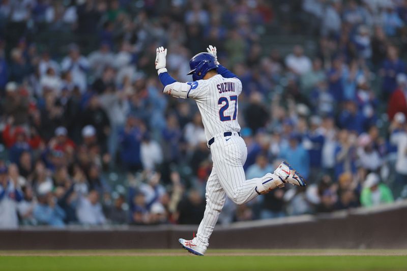 May 14, 2025; Chicago, Illinois, USA; Chicago Cubs left fielder Seiya Suzuki (27) rounds the bases after hitting a solo home run against the Miami Marlins during the fourth inning at Wrigley Field. Mandatory Credit: Kamil Krzaczynski-Imagn Images