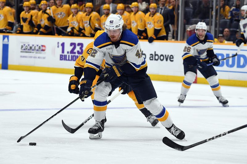 Apr 4, 2024; Nashville, Tennessee, USA; St. Louis Blues right wing Kasperi Kapanen (42) skates with the puck during the second period against the Nashville Predators at Bridgestone Arena. Mandatory Credit: Christopher Hanewinckel-USA TODAY Sports