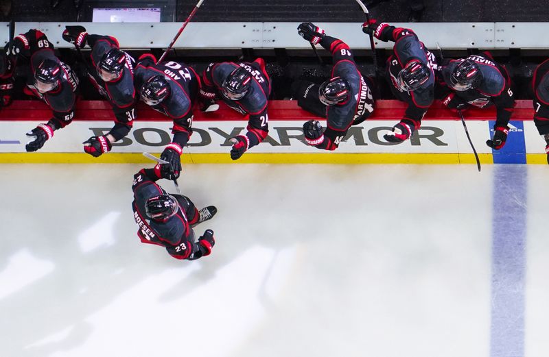 Apr 20, 2024; Raleigh, North Carolina, USA; Carolina Hurricanes right wing Stefan Noesen (23) celebrates his goal against the New York Islanders during the third period in game one of the first round of the 2024 Stanley Cup Playoffs at PNC Arena. Mandatory Credit: James Guillory-USA TODAY Sports