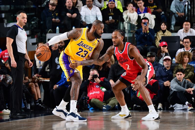 INGLEWOOD, CA - FEBRUARY 4: LeBron James #23 of the Los Angeles Lakers dribbles the ball during the game against the LA Clippers on February 4, 2025 at Intuit Dome in Los Angeles, California. NOTE TO USER: User expressly acknowledges and agrees that, by downloading and/or using this Photograph, user is consenting to the terms and conditions of the Getty Images License Agreement. Mandatory Copyright Notice: Copyright 2025 NBAE (Photo by Adam Pantozzi/NBAE via Getty Images)